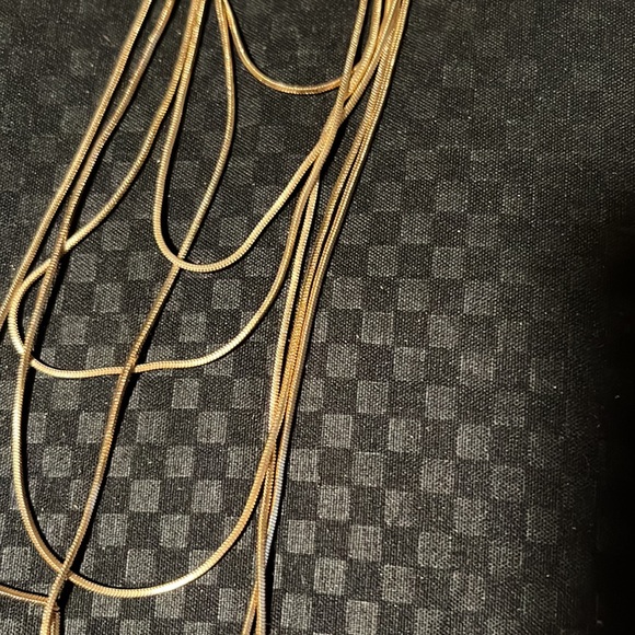 6 layer gold toned sweater nwcklace. Beautiful thin gold chain in multi layer. - Picture 2 of 3